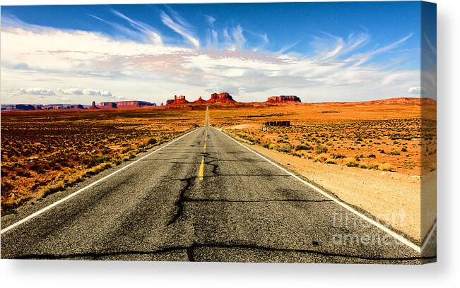Highway Canvas Print featuring the photograph Road to Navajo by Jason Abando