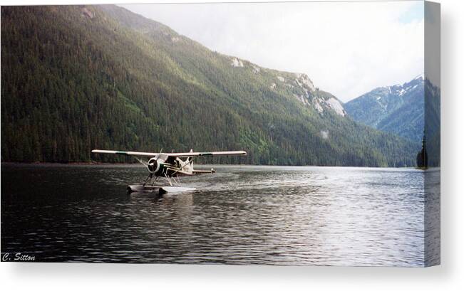 Alaska Photographs Canvas Print featuring the photograph Airplane on Lake by C Sitton