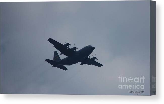 C-130 Canvas Print featuring the photograph C-130 in Flight by Susan Stevens Crosby