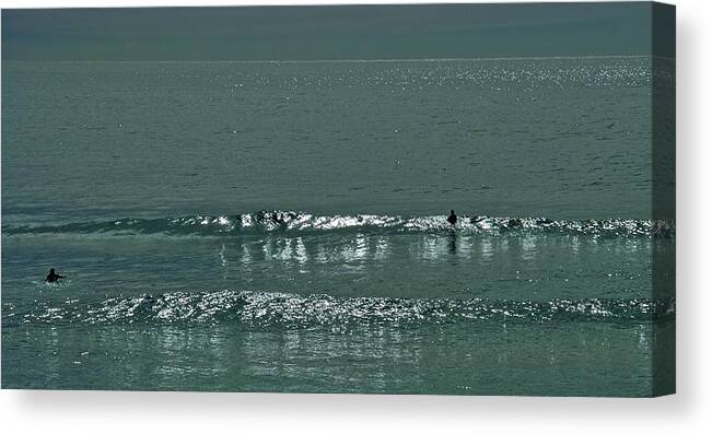 Surf Canvas Print featuring the photograph Out the back by Jocelyn Kahawai
