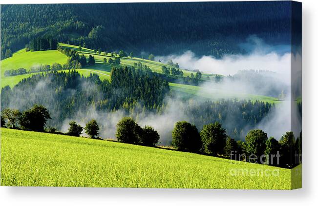 Austria Canvas Print featuring the photograph Misty valley in Austria by Andreas Berthold