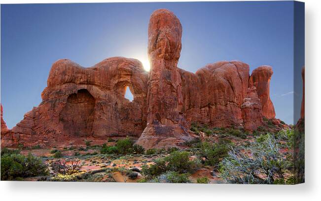 Desert Canvas Print featuring the photograph Parade of Elephants in Arches National Park by Mike McGlothlen