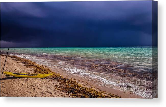 Storm Canvas Print featuring the photograph The Storm and the Paddle Boarder by George Kenhan
