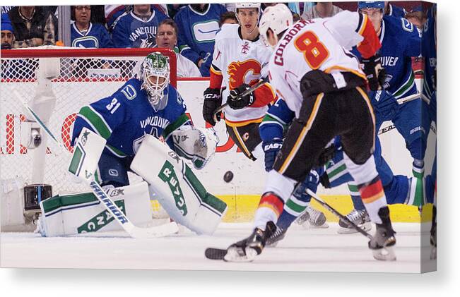 Playoffs Canvas Print featuring the photograph Calgary Flames V Vancouver Canucks - #1 by Rich Lam