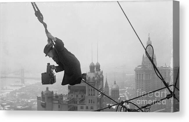 People Canvas Print featuring the photograph Photographer Balanced On Rope by Bettmann