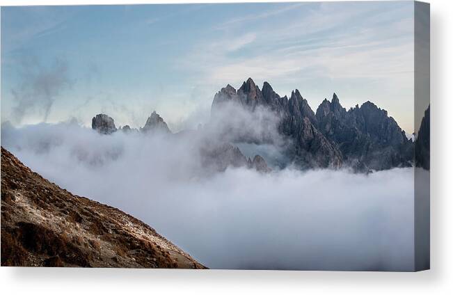 Italian Alps Canvas Print featuring the photograph Mountain landscape with fog in autumn. Tre Cime dolomiti Italy. by Michalakis Ppalis