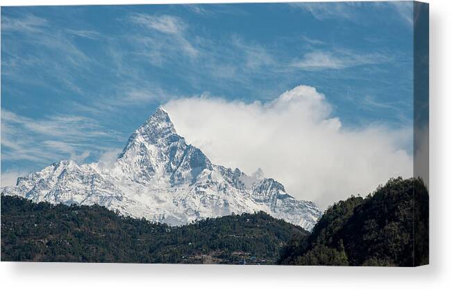 Mountains Canvas Print featuring the photograph Mountain peak covered in snow. Annapurna Nepal by Michalakis Ppalis