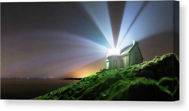 Phare Du Millier Canvas Print featuring the photograph Lighthouse Beams At Night #1 by Laurent Laveder