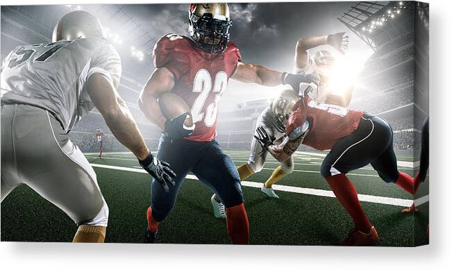 Soccer Uniform Canvas Print featuring the photograph American Football In Action #4 by Dmytro Aksonov