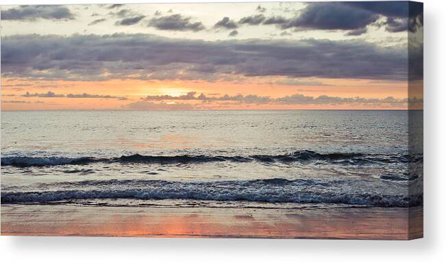 Area Canvas Print featuring the photograph Beach at sunset by Tom Gowanlock