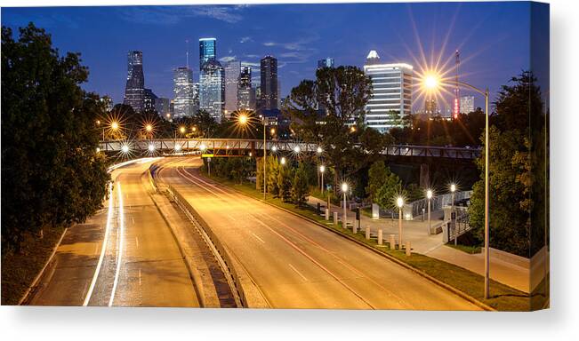 Downtown Houston Canvas Print featuring the photograph Panorama of Downtown Houston with Super Moon Rising Behind - Houston Texas by Silvio Ligutti