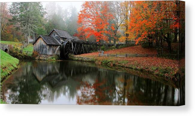 Mabry Mill Canvas Print featuring the photograph Autumn Foggy Morning At Mabry Mill Virginia by Carol Montoya