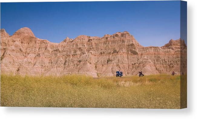 South Dakota Canvas Print featuring the photograph Badlands Bikers by Hermes Fine Art