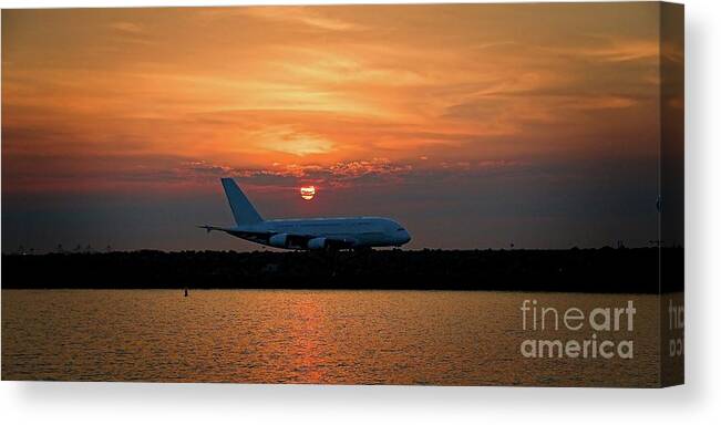 Sunnypicsoz Canvas Print featuring the photograph Commercial Jet Aircraft at Sunset by Geoff Childs