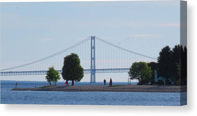 Mackinac Bridge Canvas Print featuring the photograph Mackinac Island Panorama with the Mighty Mac by Keith Stokes