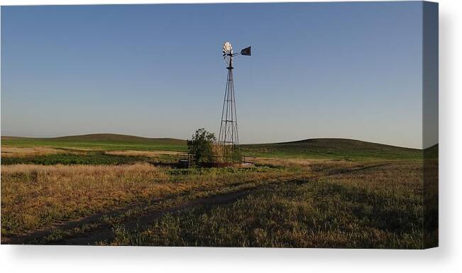 Windmill Canvas Print featuring the photograph Prairie Windmill At Sunset by Keith Stokes