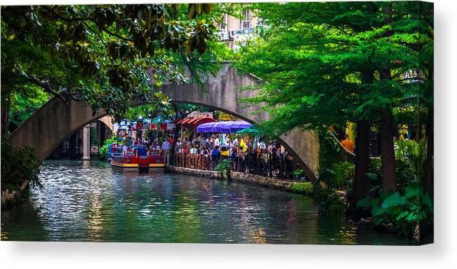 Arched Bridge Canvas Print featuring the photograph River Walk Dining by Ed Gleichman