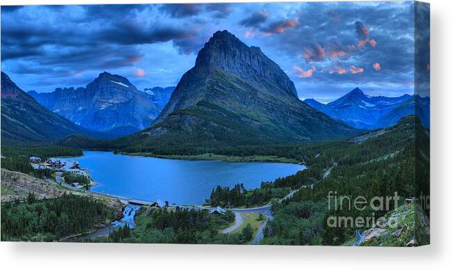Swiftcurrent Lake Canvas Print featuring the photograph Stormy Sunrise Over Grinnell Peak by Adam Jewell