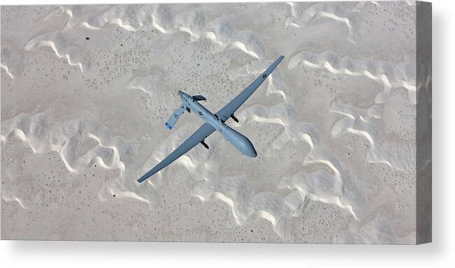Aerodynamic Canvas Print featuring the photograph An Mq-1 Predator Flies A Training by High-g Productions/stocktrek Images