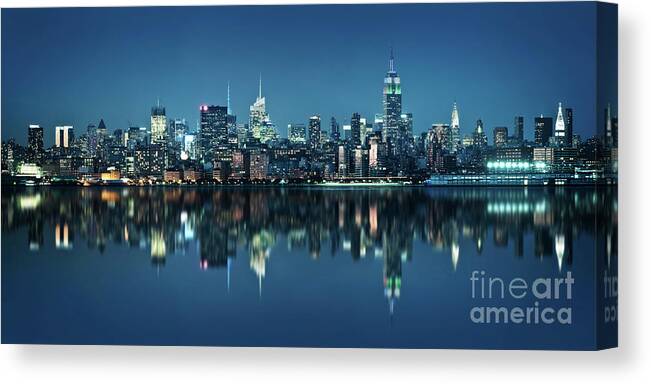 New York Canvas Print featuring the photograph New York skyline at night, blue hour panorama by Delphimages Photo Creations