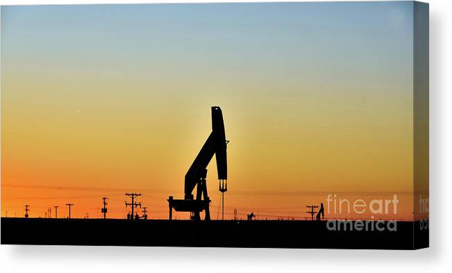 Oil Field Canvas Print featuring the photograph Oil Rig At Sunset 2 #texas by Andrea Anderegg