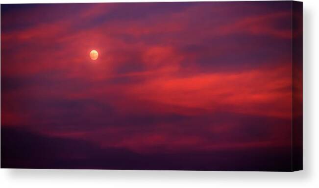 Clouds Canvas Print featuring the photograph Red Moon by Steve Sullivan