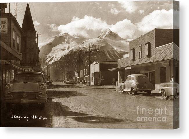 Skagway Canvas Print featuring the photograph Broadway in Skagway Alaska street scene circa 1957 by Monterey County Historical Society