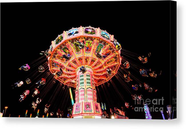 Swing Ride At The Fair Canvas Print featuring the photograph Swing Ride At The Fair by Felix Lai