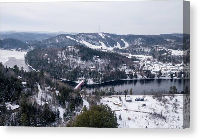 Gatineau River Canvas Print featuring the photograph Wakefield covered bridge. by Rob Huntley