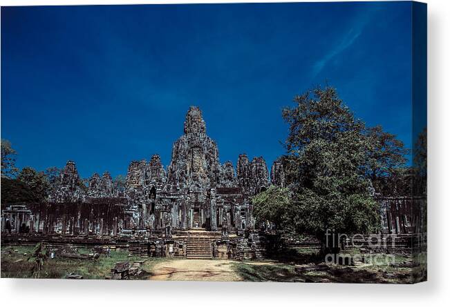  Canvas Print featuring the photograph Bayon Temple #1 by Arik S Mintorogo