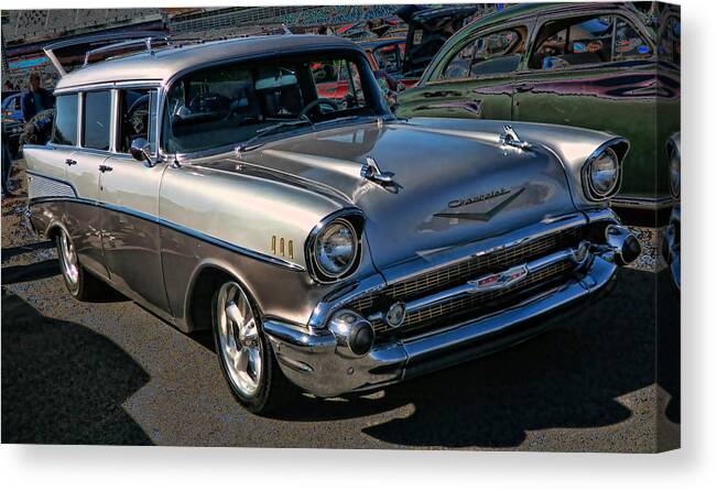 Victor Montgomery Canvas Print featuring the photograph '57 Chevy Wagon #57 by Vic Montgomery