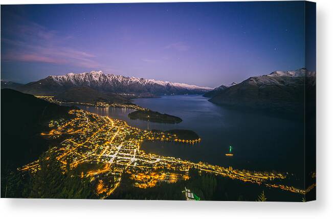 Tranquility Canvas Print featuring the photograph Aerial view of Queenstown cityscape at night, New Zealand by Lingxiao Xie