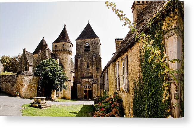 Saint Genies Canvas Print featuring the photograph Asymmetric Tower and church of Saint Genies Perigord by Weston Westmoreland