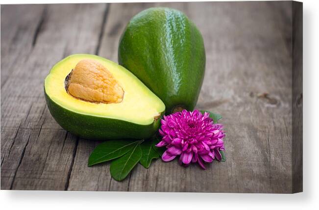 Avacado Canvas Print featuring the photograph Avacados by Aged Pixel