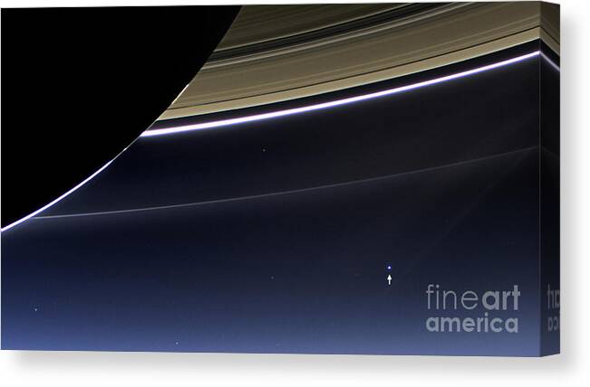 Saturn Canvas Print featuring the photograph Cassini View Of Saturn And Earth by Science Source