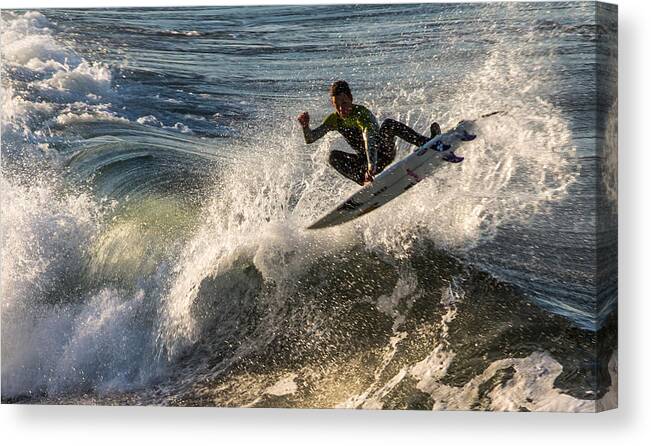 Surfing Canvas Print featuring the photograph Coming up for Air by John Daly