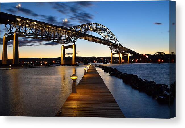 Cityscapes-marina-john Blatnik Bridge-superior Wisconsin-nightscapes-landscapes-water-bridges-evening-sunsets-docks Canvas Print featuring the digital art Darkness Falls by Gregory Israelson