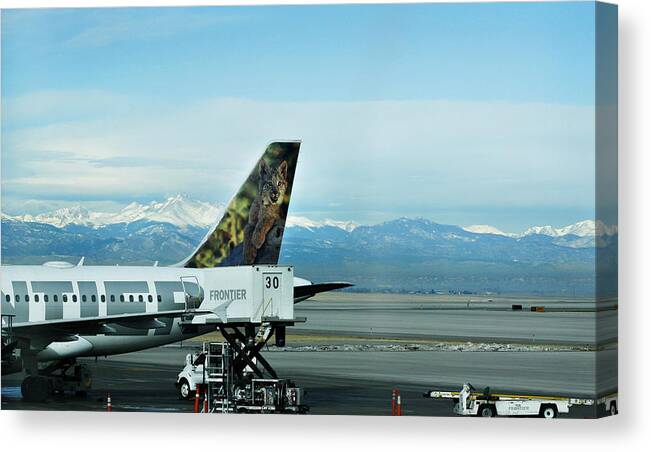 Frontier Canvas Print featuring the photograph Denver Airport with Rockies in background by Marilyn Hunt