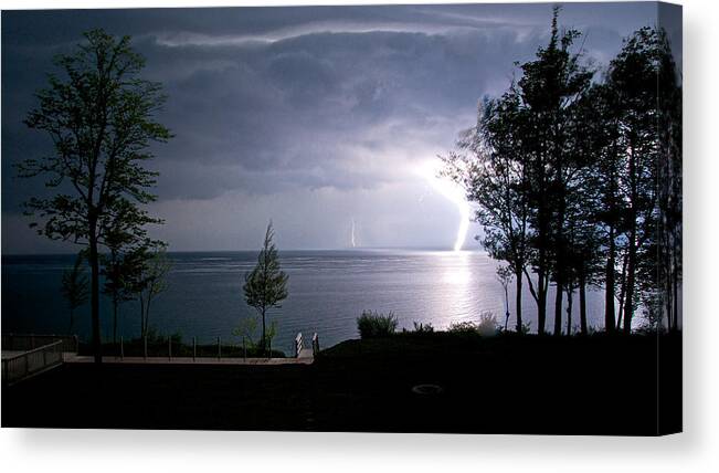 Landscapes Canvas Print featuring the photograph Lightning on Lake Michigan at Night by Mary Lee Dereske