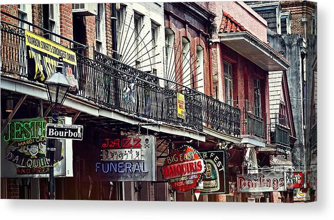 Bourbon Canvas Print featuring the photograph Signs on Rue Bourbon by Bob Hislop