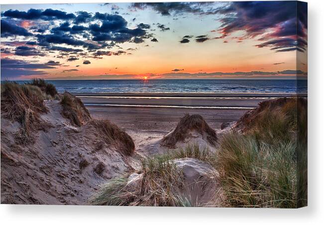Vacation Canvas Print featuring the photograph Sunset over Formby Beach through dunes by Steven Heap