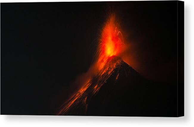 Releasing Canvas Print featuring the photograph Volcan de Fuego (Volcano of Fire) by night, Antigua, Guatemala, Central America by Kryssia Campos
