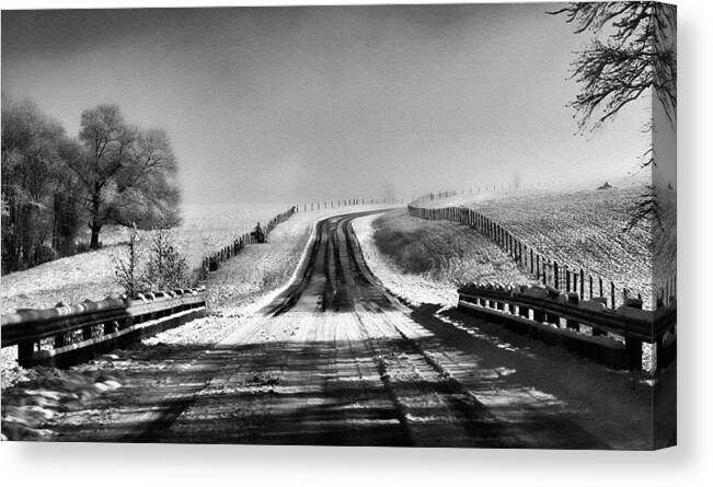 Snow Canvas Print featuring the photograph Snowy Road by Brent Craft