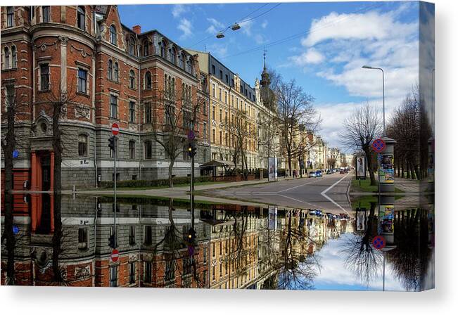 #city#street#water#flood#rain#colours#sky#reflection#travel#riga#latvia#clouds# Canvas Print featuring the photograph after the rain...Riga Latvia by Aleksandrs Drozdovs