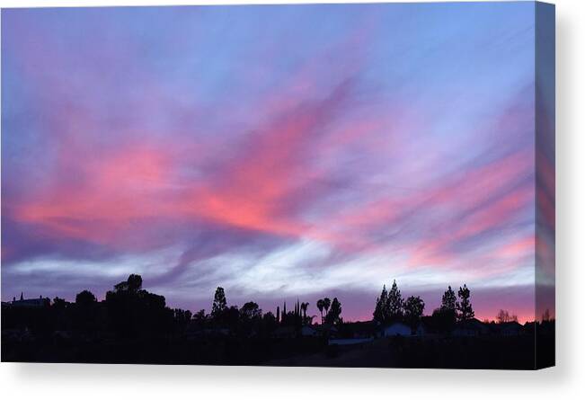 Linda Brody Canvas Print featuring the photograph Blue and Pink Clouds VII by Linda Brody