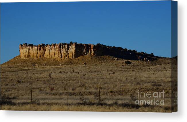 Southwest Landscape Canvas Print featuring the photograph Bluff at dusk by Robert WK Clark