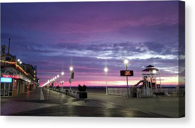 Ocean City Canvas Print featuring the photograph Boards Under Colorful Skies by Robert Banach