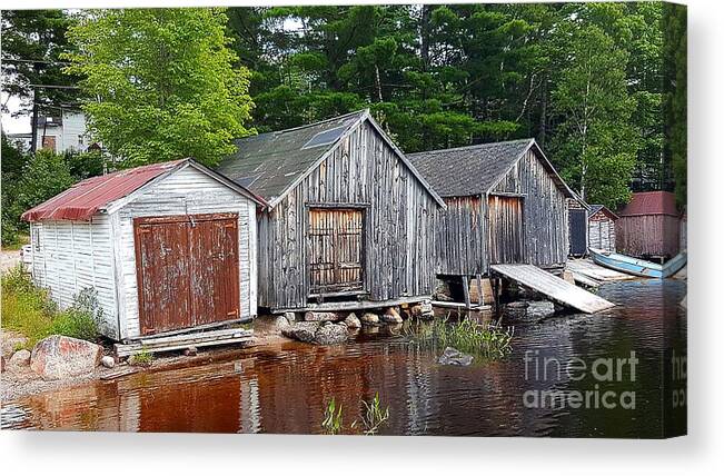 Boat Canvas Print featuring the photograph Boathouses - McAdam NB by Michael Graham