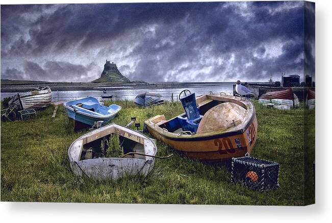 Lindisfarne Canvas Print featuring the photograph Boats at Lindisfarne by Brian Tarr