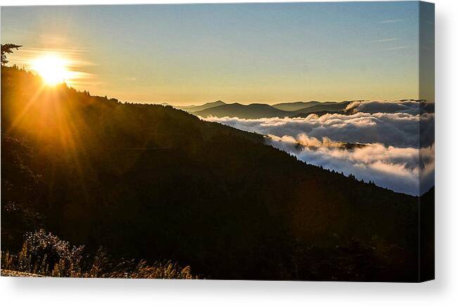 Landscape Canvas Print featuring the photograph Daylight Above the Clouds by Chuck Brown